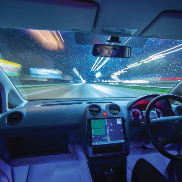 Glass Treatments in USA Driving a car in the rain with great vision due to the TintCompany glass treatments